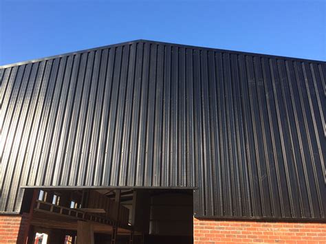 black metal cladding sheets|galvanised steel cladding.